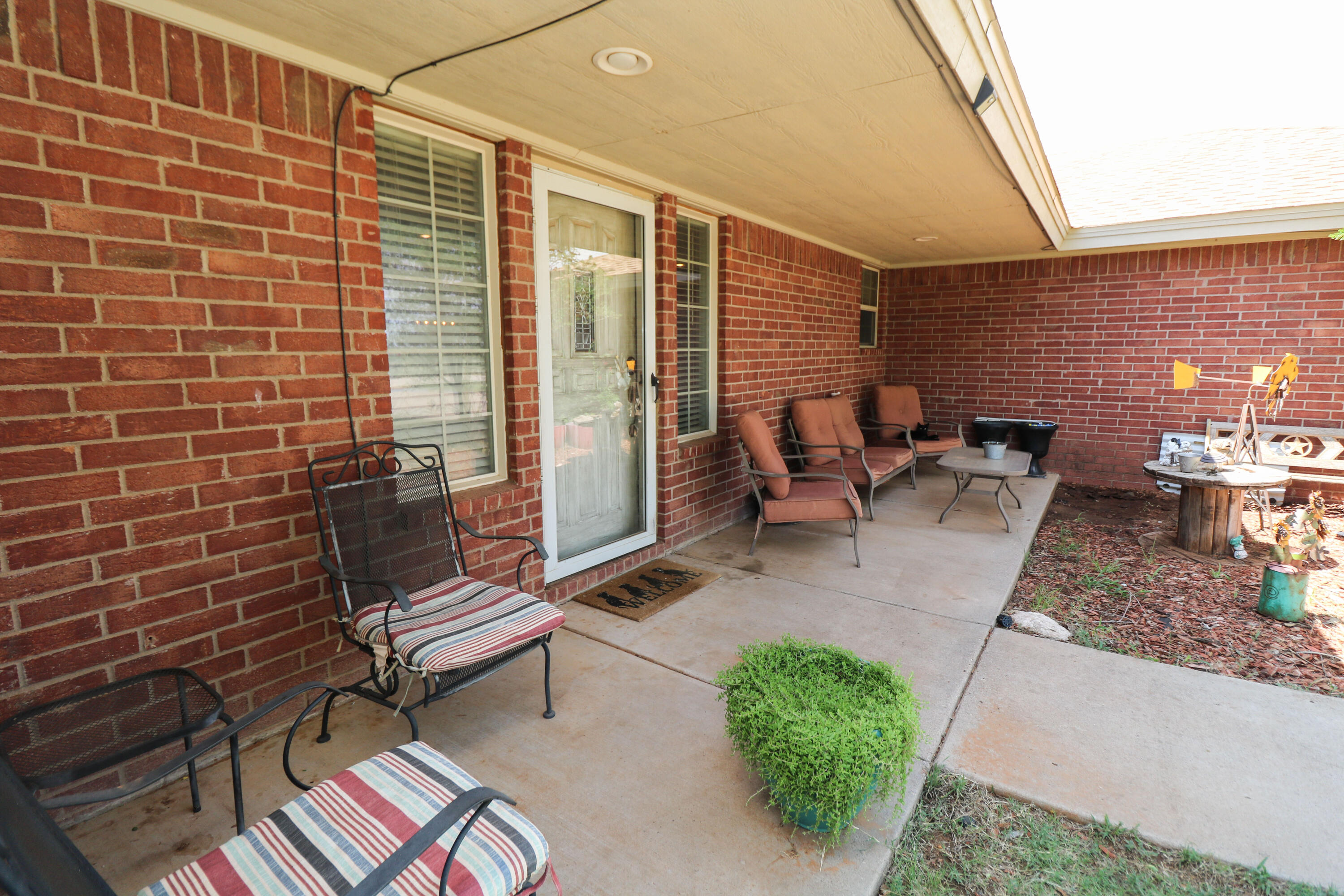 2401 Highway 385, Unit B Littlefield, TX 79339 - Photo 3 of 28 a balcony with chairs and with outdoor views