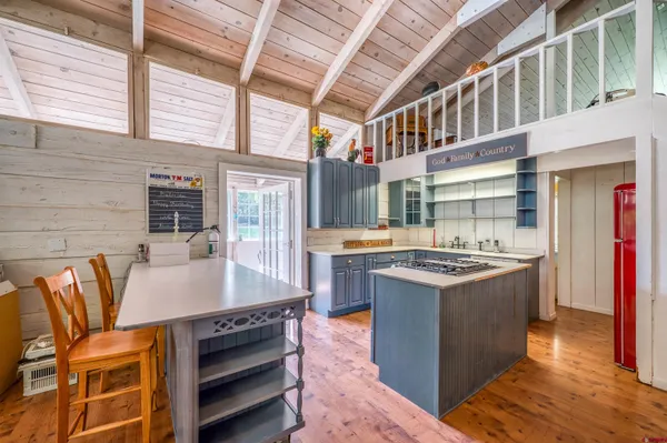 a view of a room with wooden floor and balcony