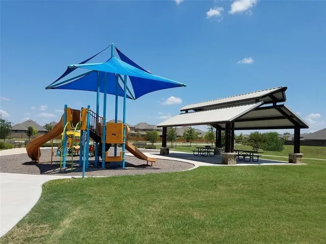 a view of a park with slide