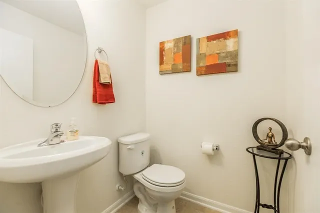 a bathroom with a sink and a toilet