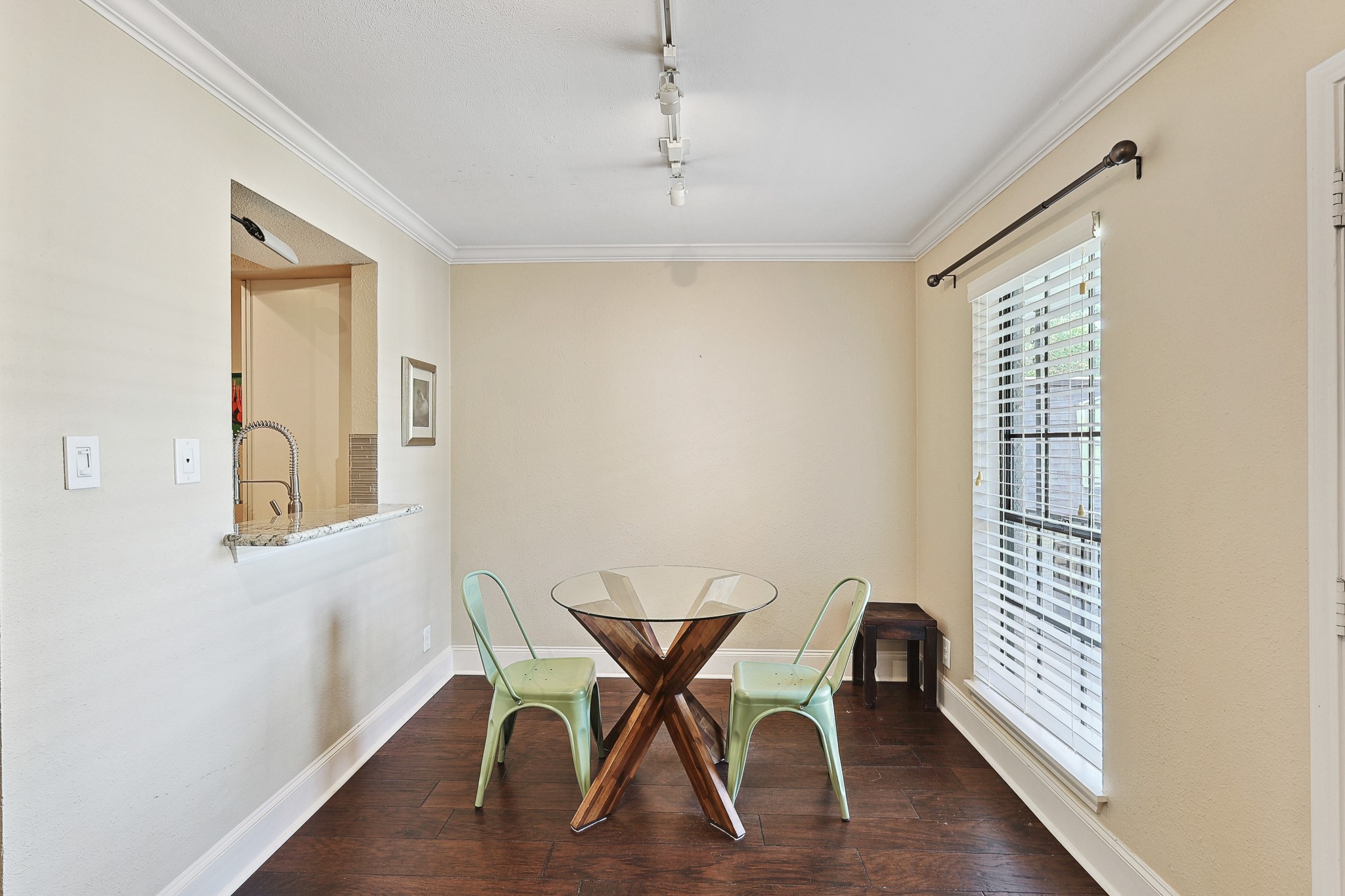 3402 Garrott Street, Unit 15 Houston, TX 77006 - Photo 2 of 17 a view of a dining room with furniture and wooden floor