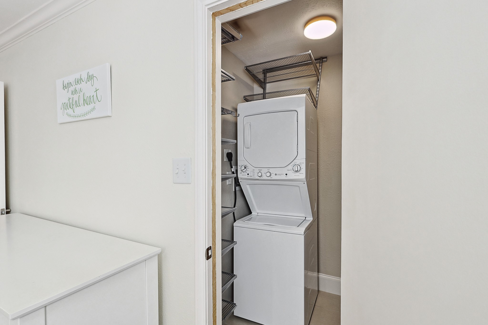3402 Garrott Street, Unit 15 Houston, TX 77006 - Photo 8 of 17 a utility room with dryer and washer