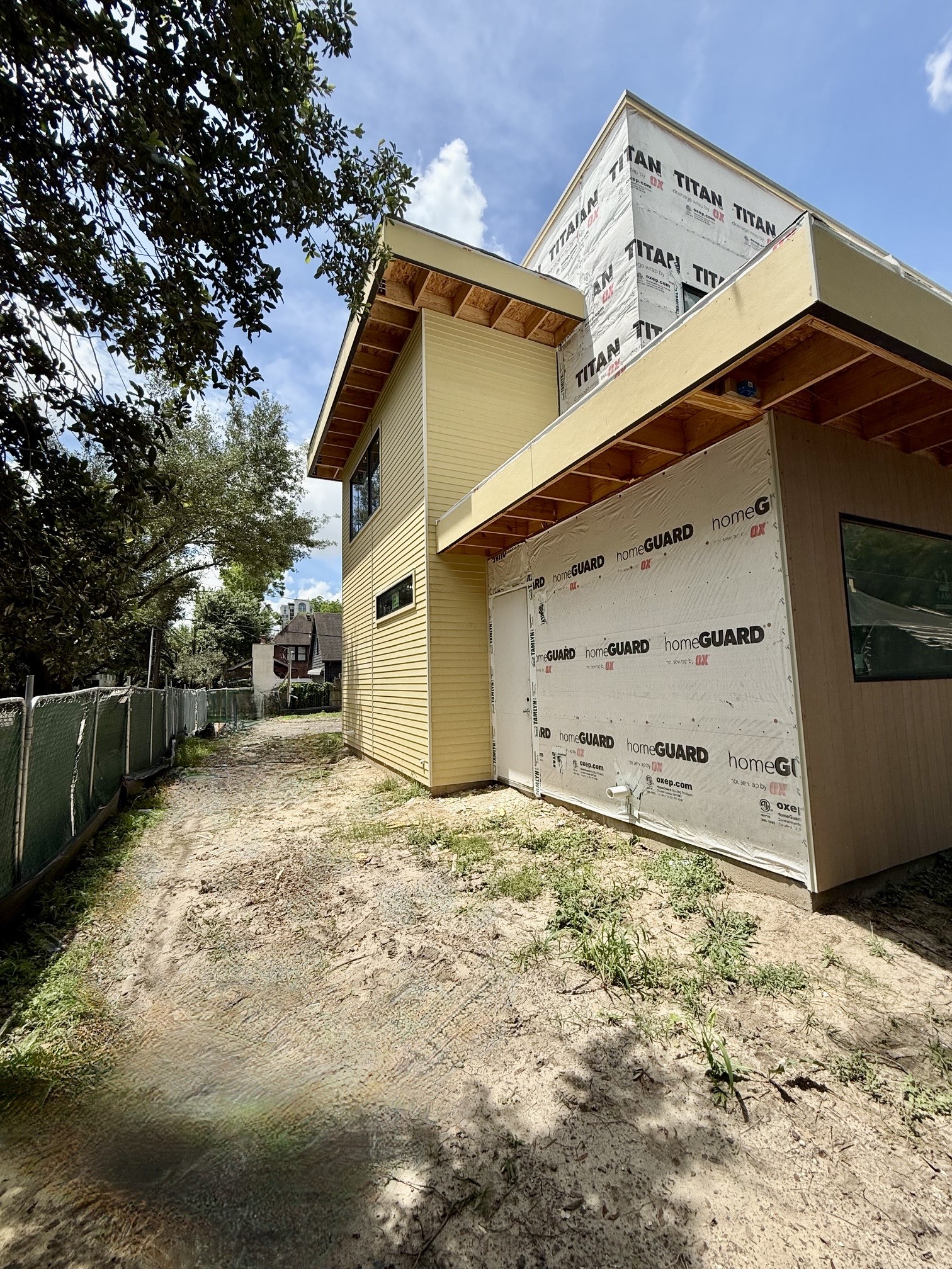1701 Banks Street Houston, TX 77098 - Photo 7 of 50 a view of a house with a yard