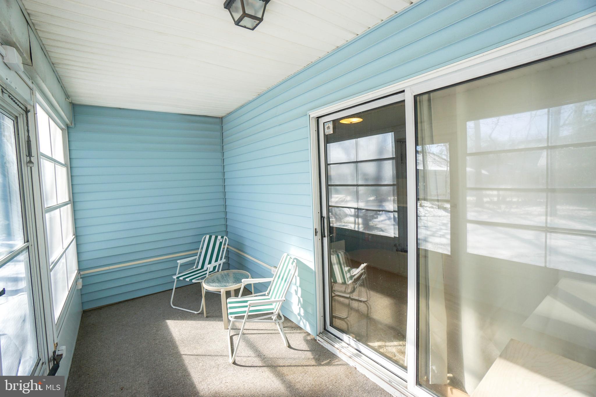 216 Danbury Drive Little Egg Harbor, NJ 08087 - Photo 18 of 19 a house that has glass door