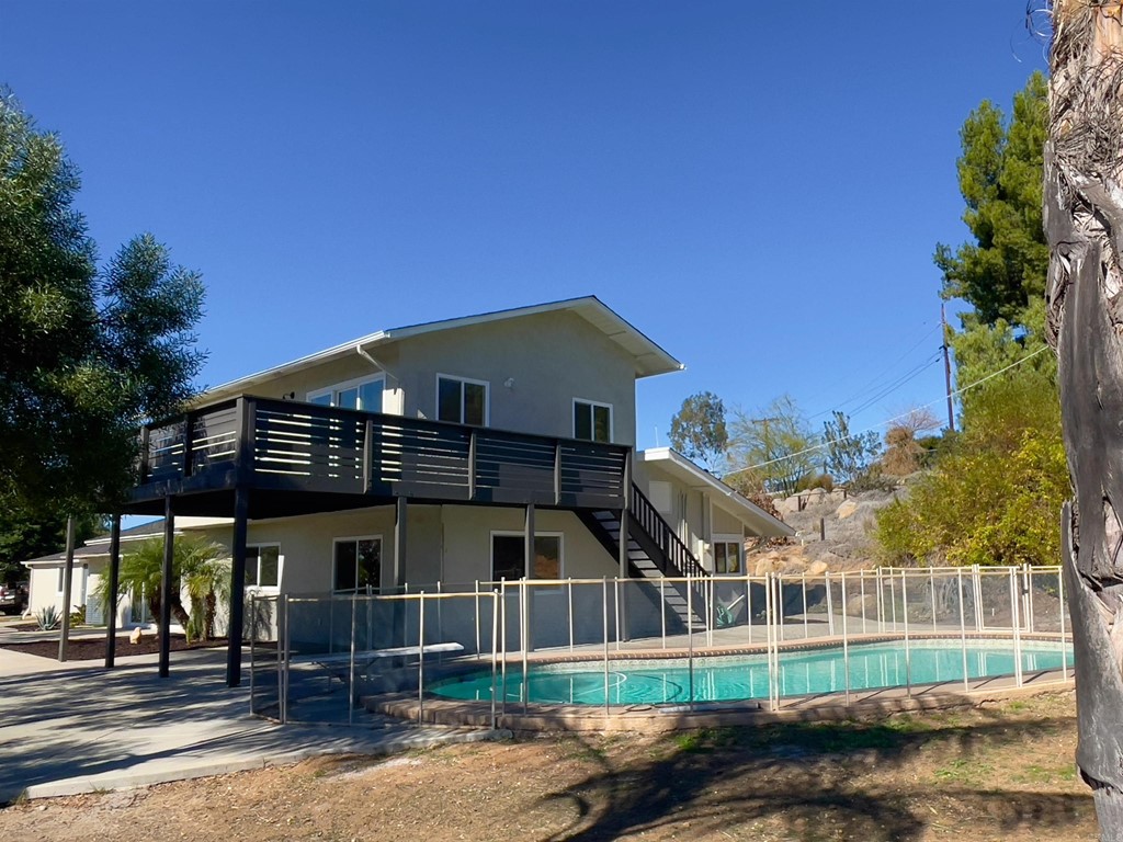 2159 Shire Drive El Cajon, CA 92019 - Photo 5 of 18 a front view of a house with a yard