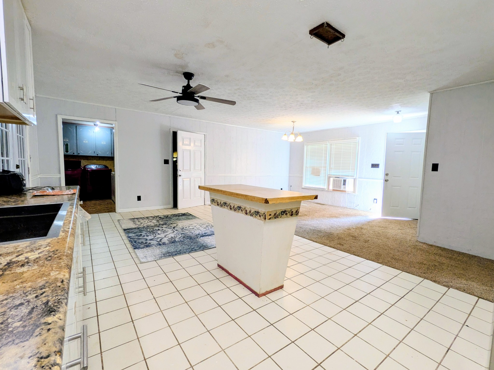 3416 Erin Road McEwen, TN 37101 - Photo 12 of 43 a view of a bathroom with a sink and a mirror