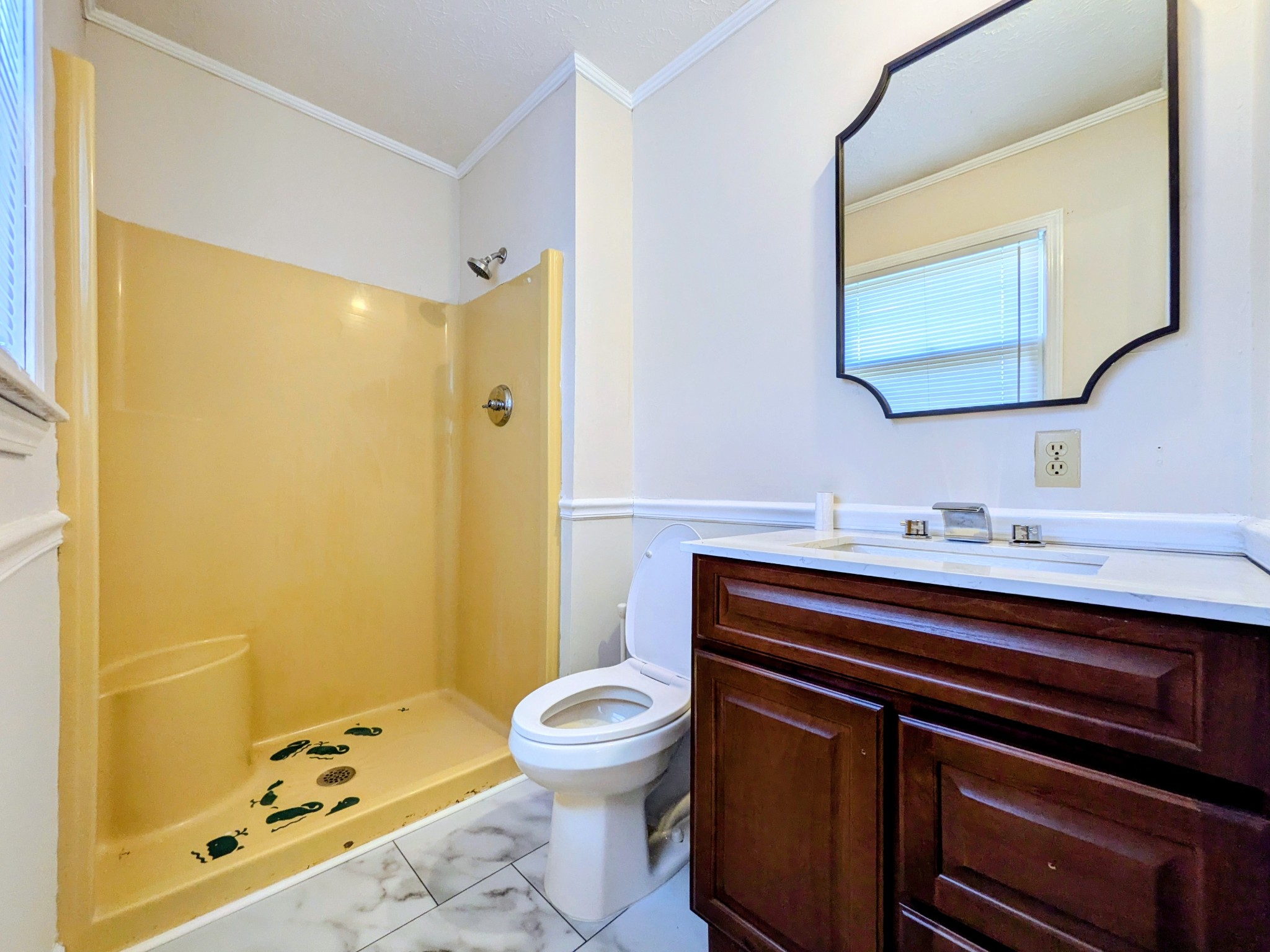 3416 Erin Road McEwen, TN 37101 - Photo 19 of 43 a bathroom with a sink a toilet a mirror and shower