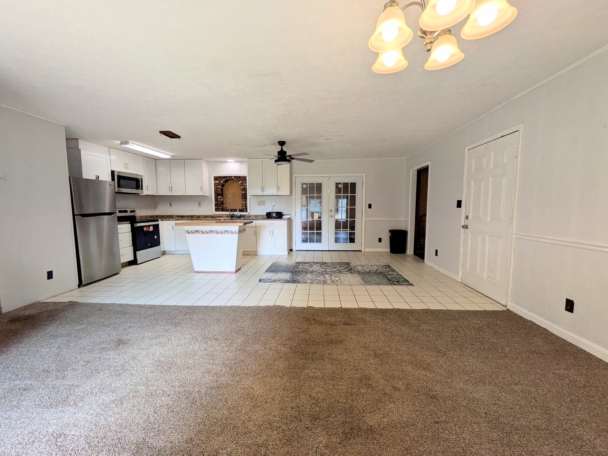 3416 Erin Road McEwen, TN 37101 - Photo 3 of 43 a view of a kitchen with a sink and a refrigerator