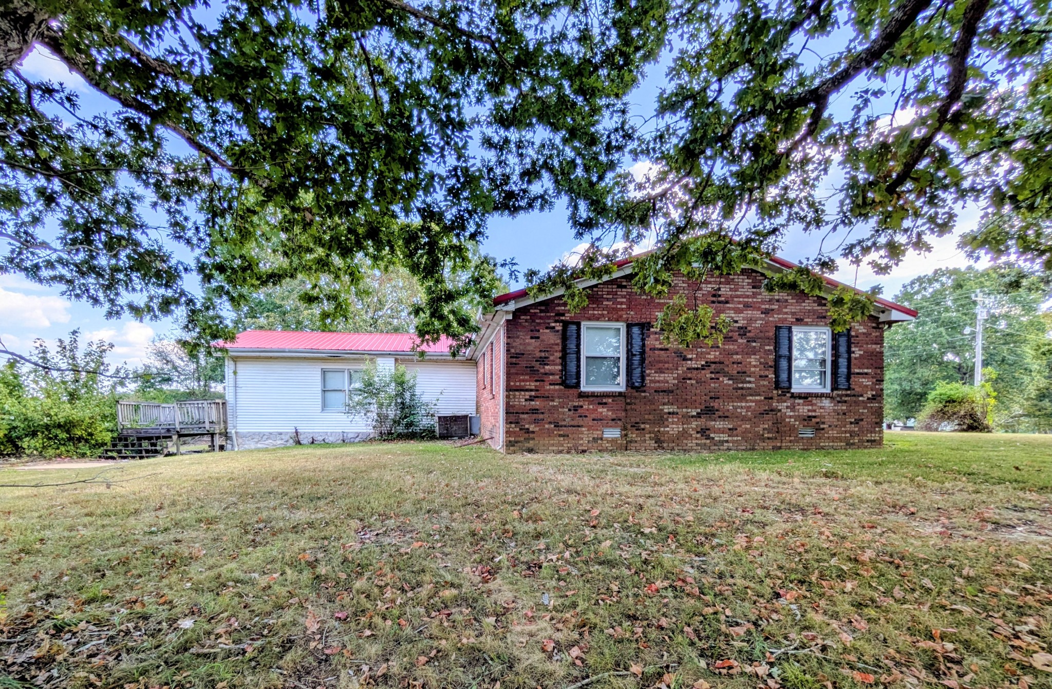 3416 Erin Road McEwen, TN 37101 - Photo 34 of 43 a house with a tree in front of it