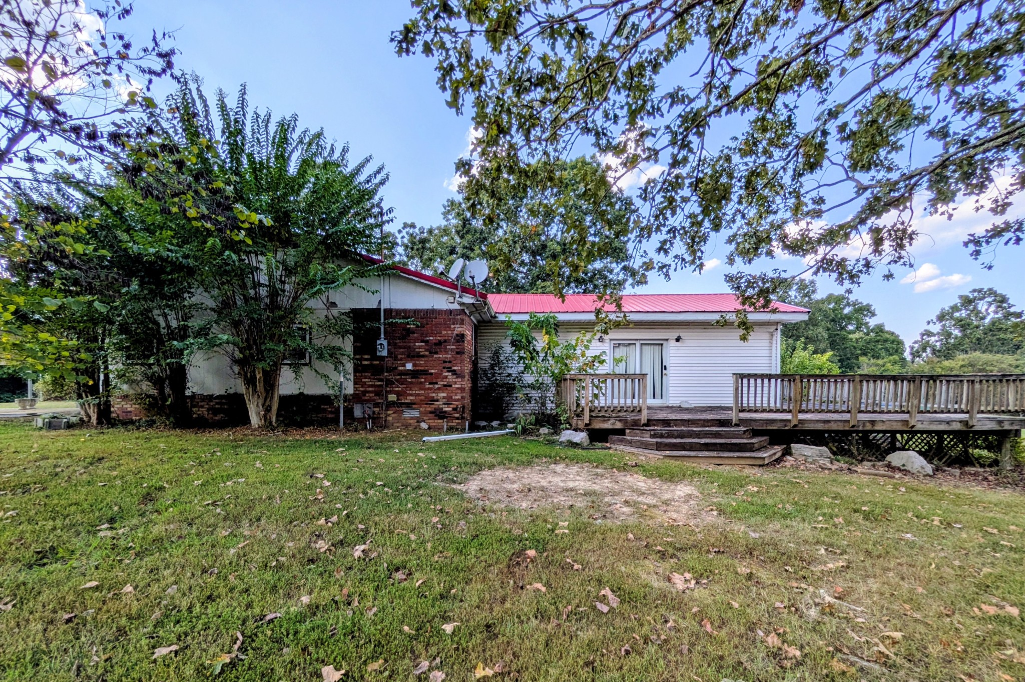 3416 Erin Road McEwen, TN 37101 - Photo 35 of 43 a view of a house with a yard and sitting area
