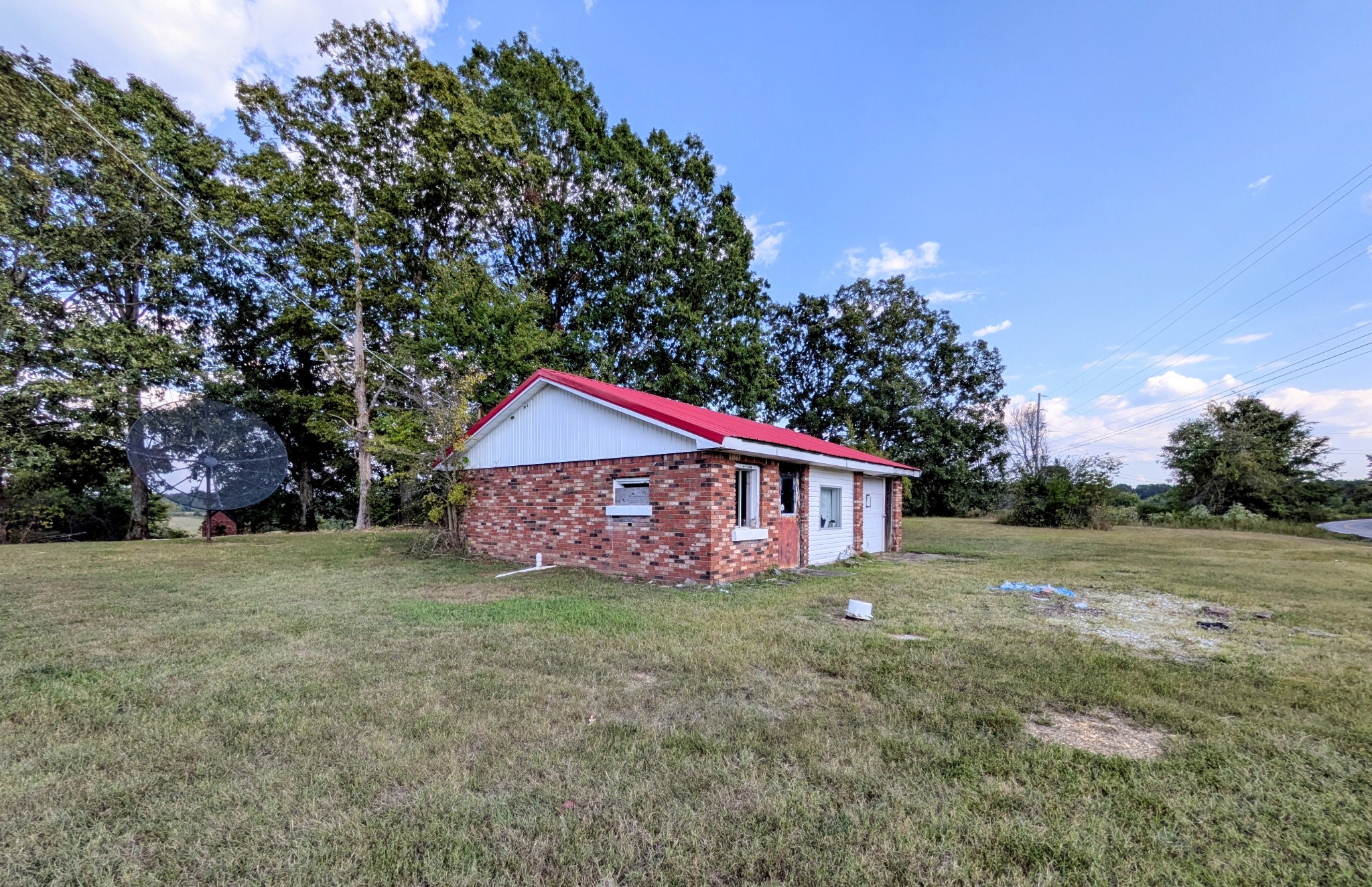 3416 Erin Road McEwen, TN 37101 - Photo 41 of 43 a view of a house with a yard and a large tree
