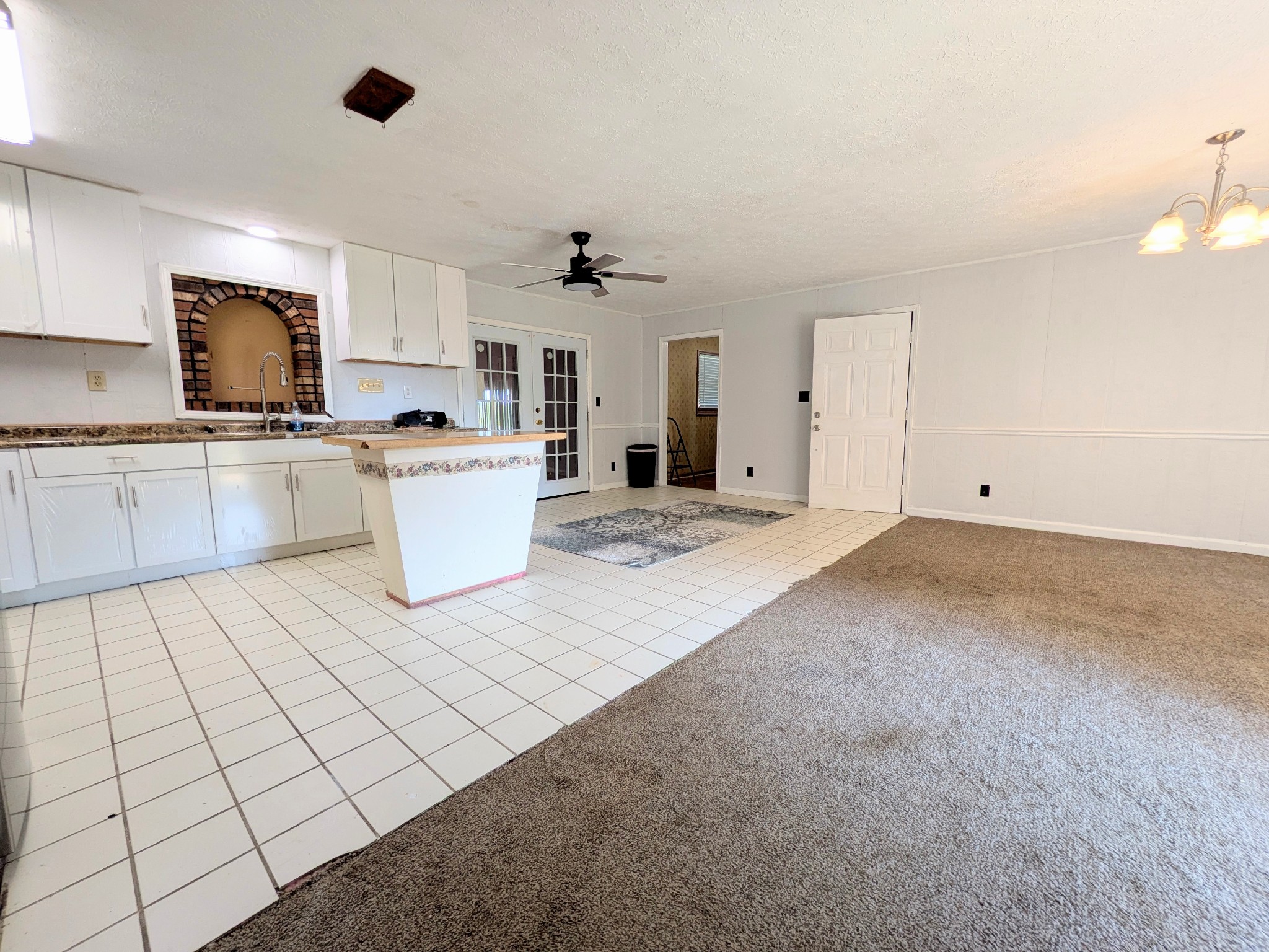 3416 Erin Road McEwen, TN 37101 - Photo 10 of 43 a view of a kitchen with microwave and cabinets