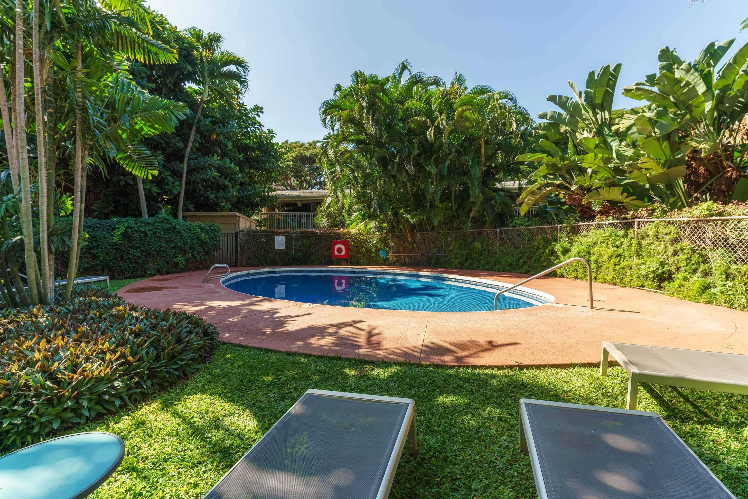 4440 Lower Honoapiilani Road, Unit 154 Lahaina, HI 96761 - Photo 26 of 32 a view of a swimming pool with a yard