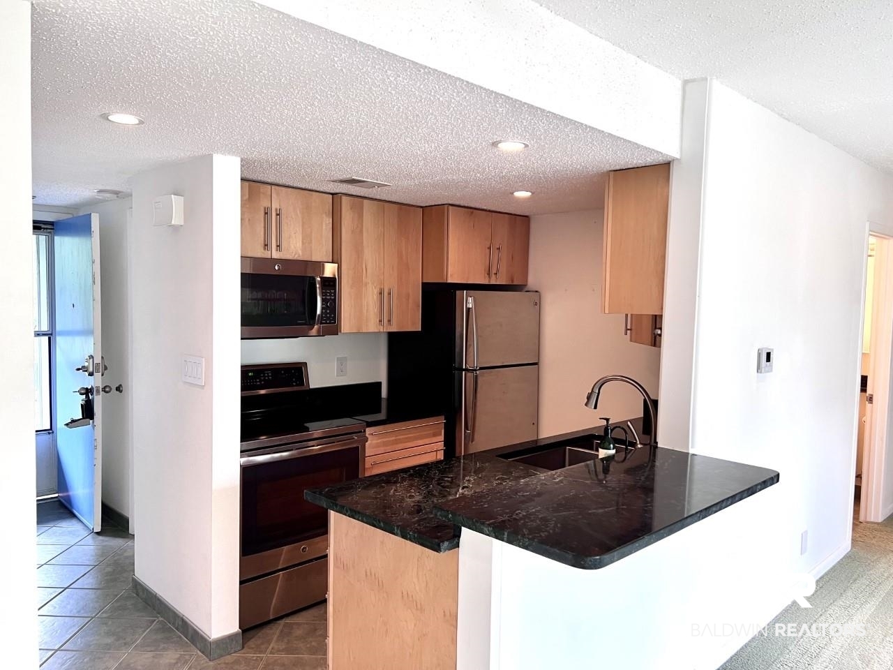 208 Golf Terrace, Unit 208 Daphne, AL 36526 - Photo 6 of 22 Kitchen View