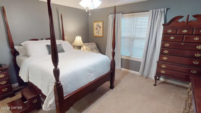 a bedroom with a bed and a closet