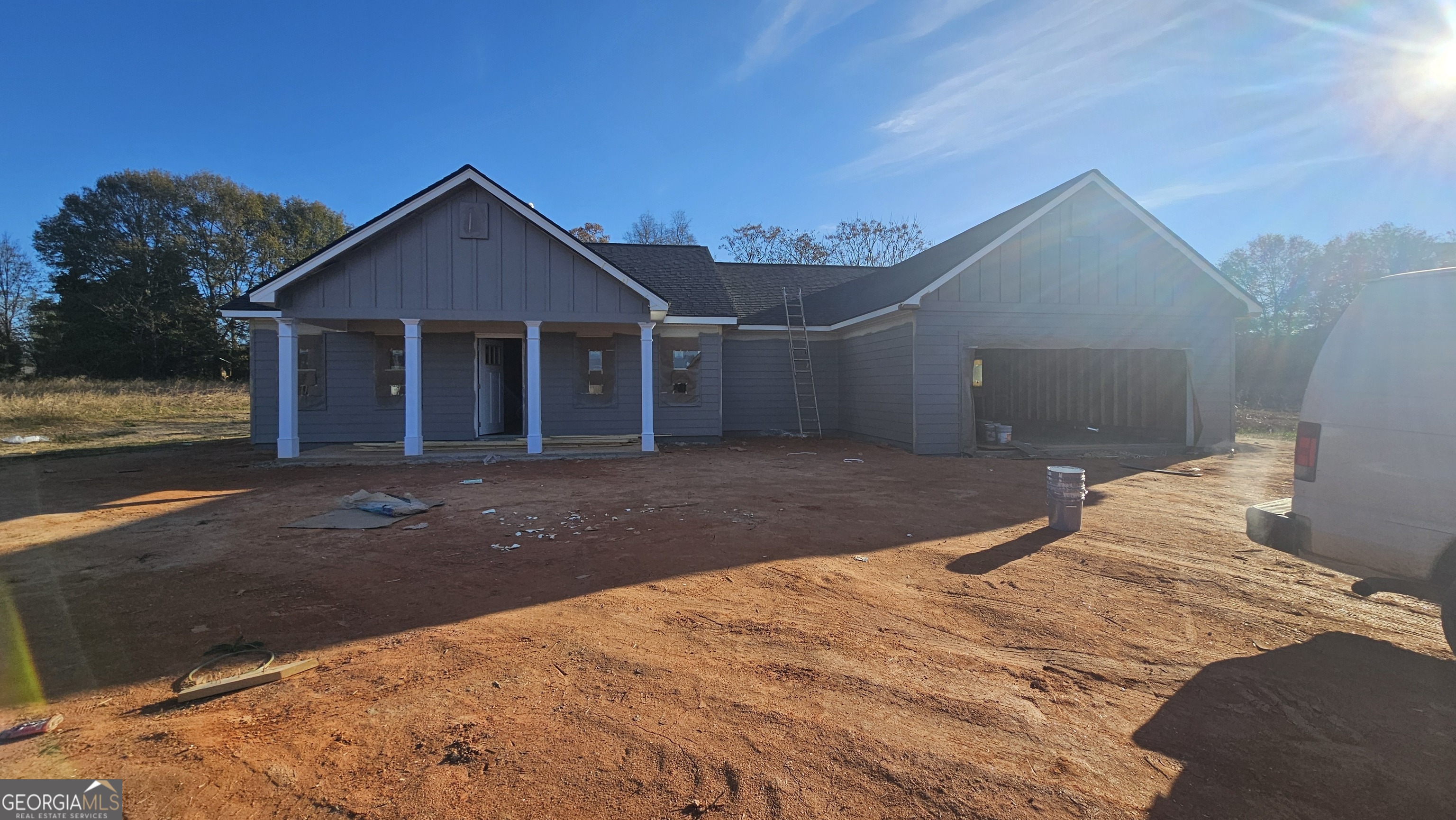 106 Colbert Cove, Unit 3 Colbert, GA 30628 - Photo 1 of 1 a front view of a house with a yard