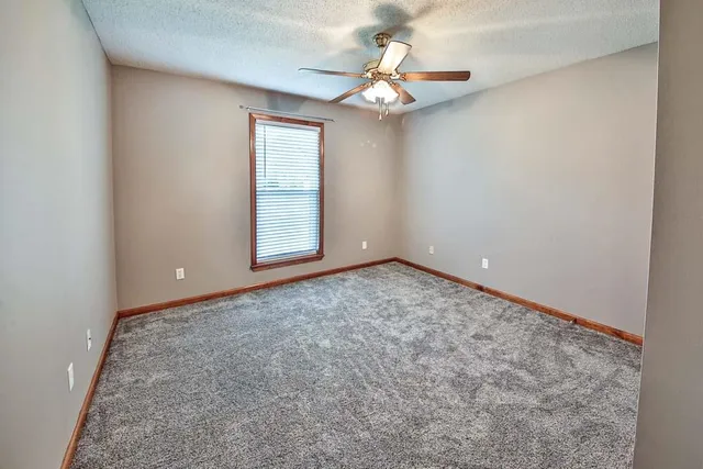 en empty room with windows