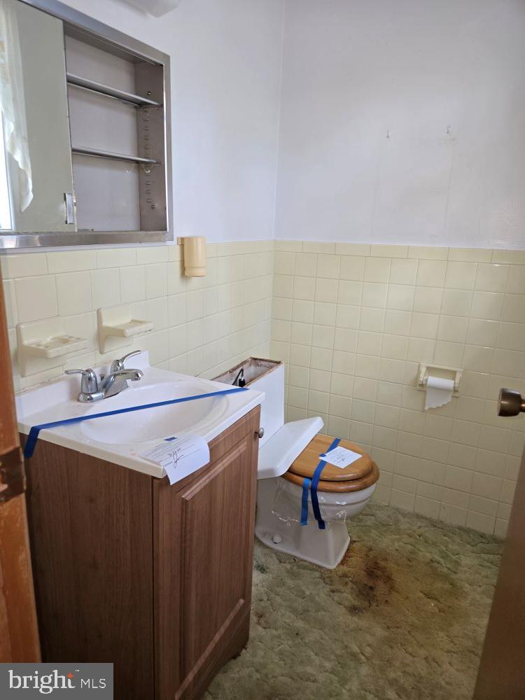 2034 Cherry Court Edgewood, MD 21040 - Photo 19 of 38 a bathroom with a sink and a toilet