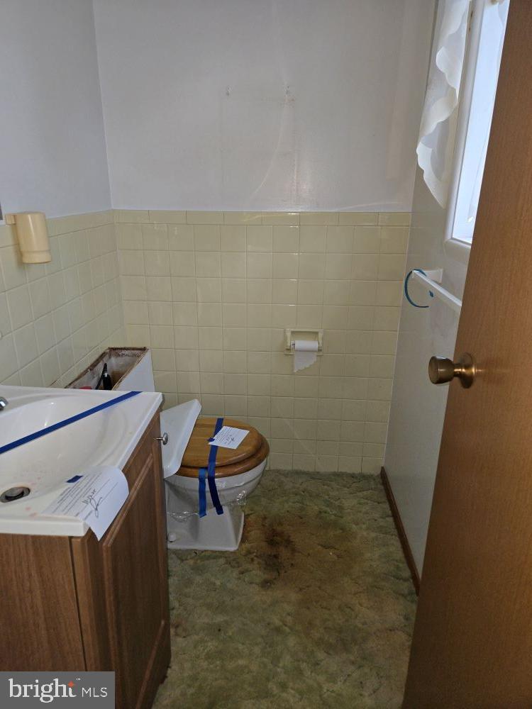 2034 Cherry Court Edgewood, MD 21040 - Photo 20 of 38 a bathroom with a sink a toilet and a shower