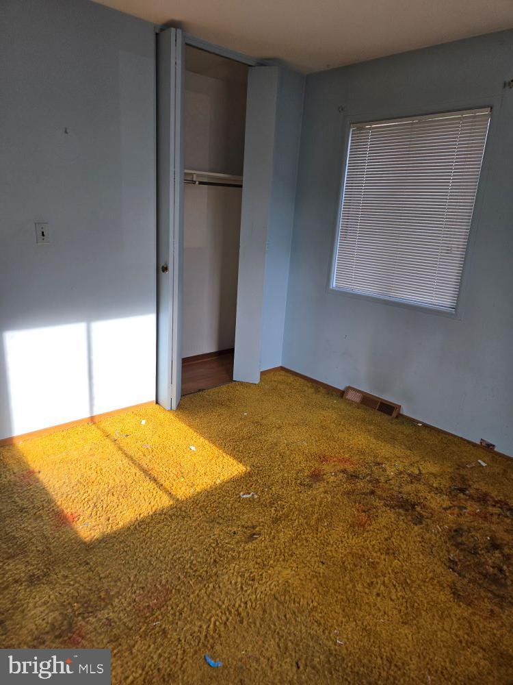 2034 Cherry Court Edgewood, MD 21040 - Photo 23 of 38 a view of empty room with a fireplace