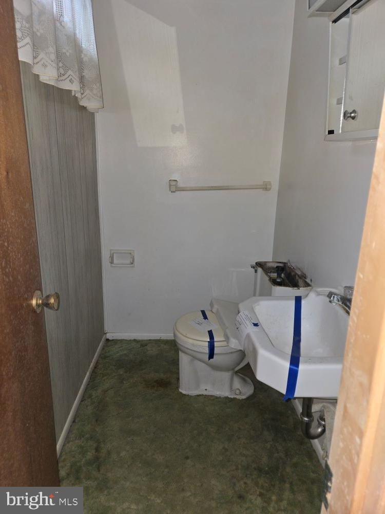 2034 Cherry Court Edgewood, MD 21040 - Photo 30 of 38 a bathroom with a sink and a toilet