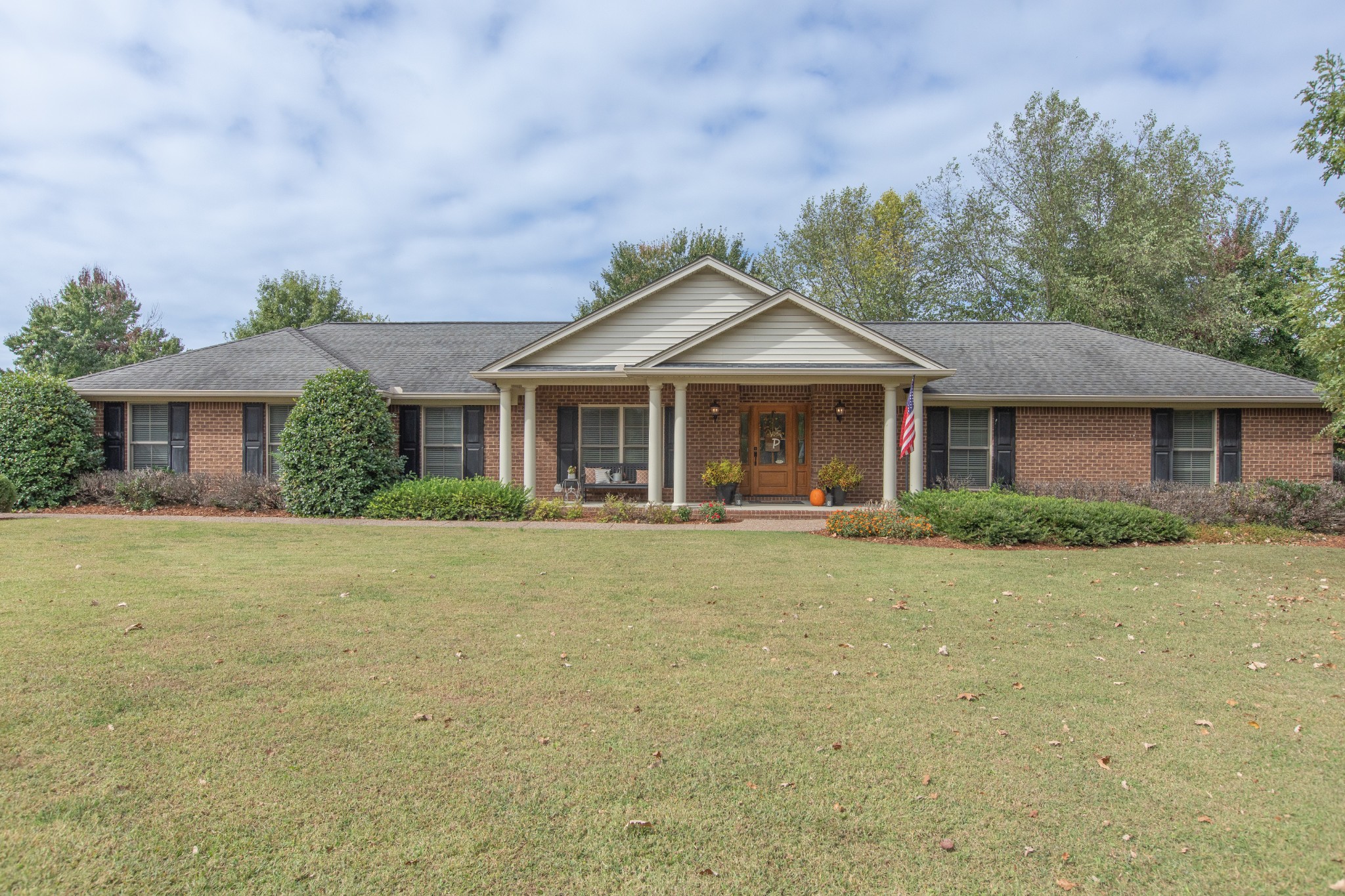 2013 Stratford Road Murfreesboro, TN 37129 - Photo 1 of 46 a front view of a house with a garden