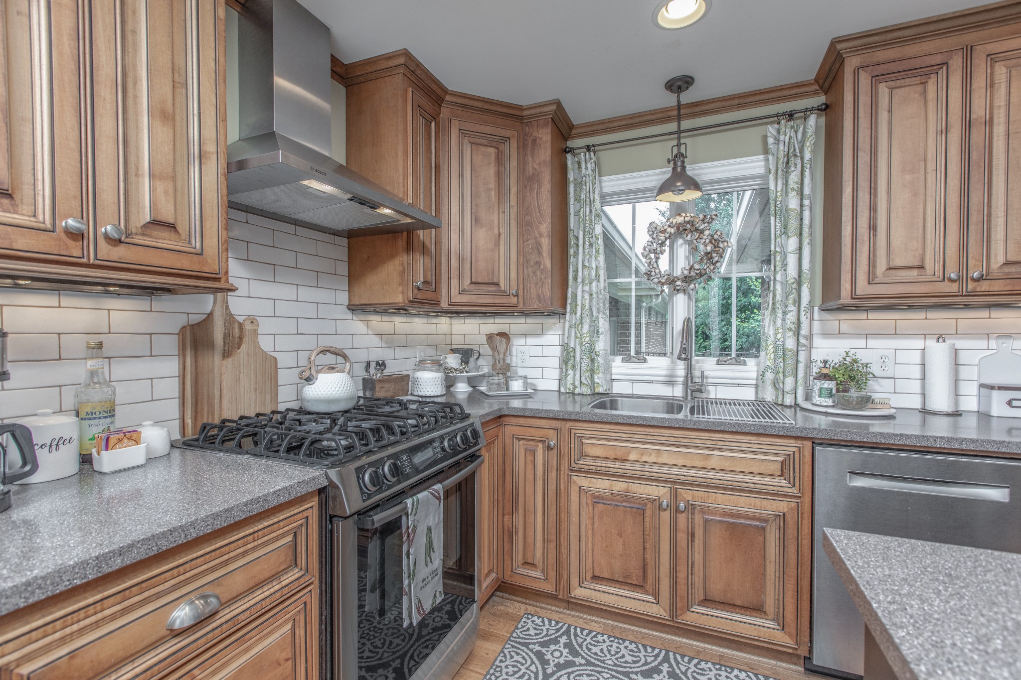 2013 Stratford Road Murfreesboro, TN 37129 - Photo 17 of 46 a kitchen with stainless steel appliances granite countertop a sink stove and cabinets