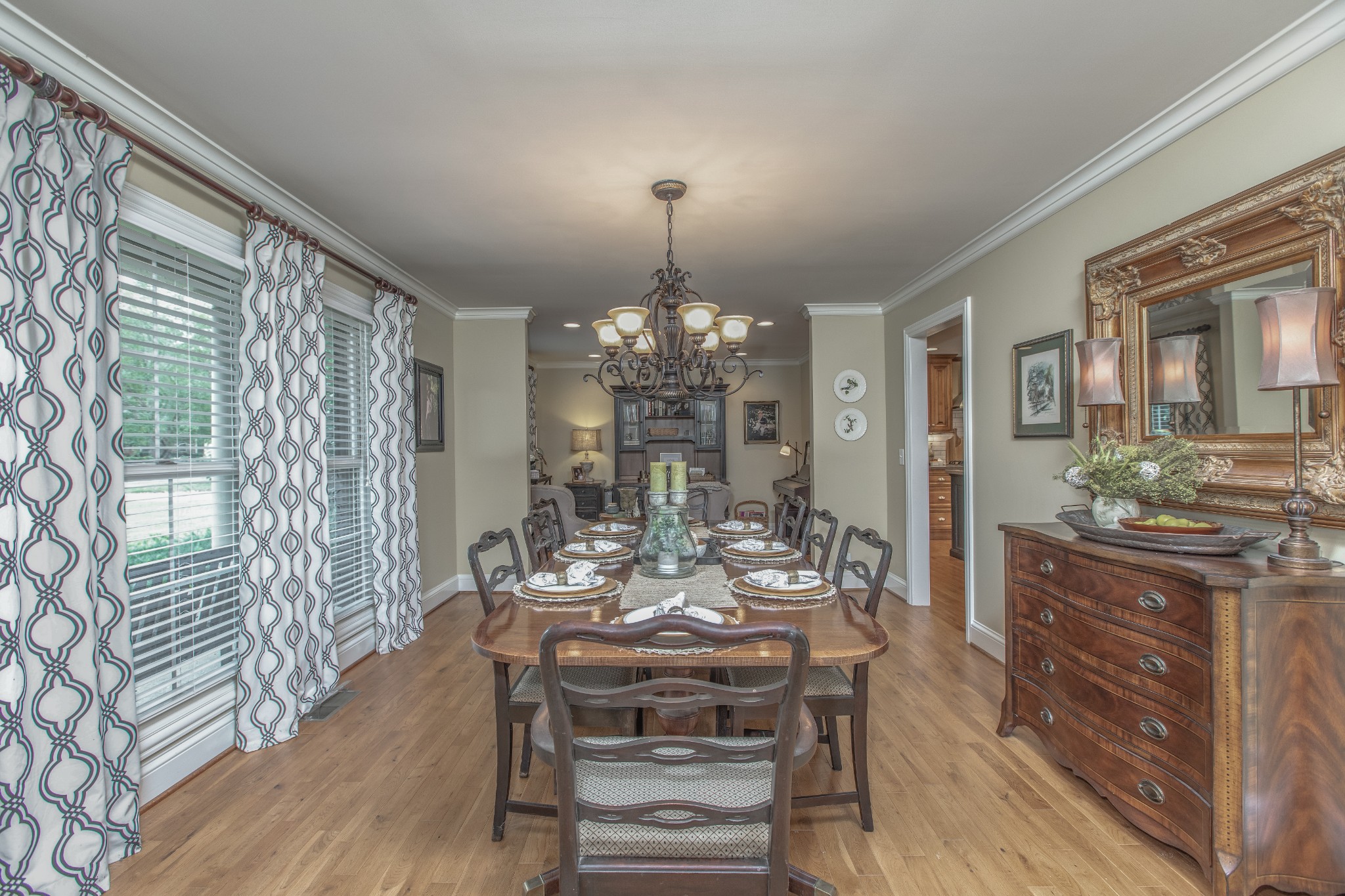 2013 Stratford Road Murfreesboro, TN 37129 - Photo 5 of 46 a view of a dining room with furniture a chandelier and wooden floor