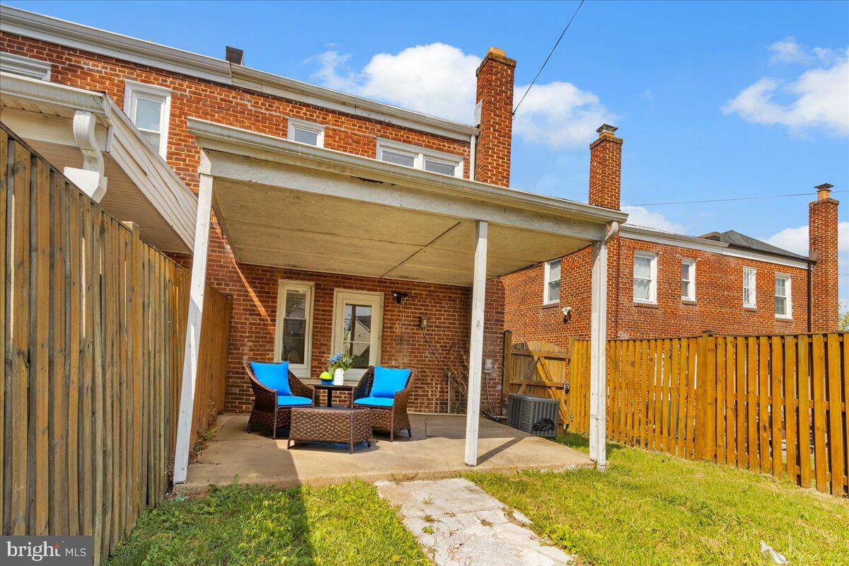 1193 46th Place Southeast Washington, DC 20019 - Photo 14 of 17 a view of a patio with a table and chairs