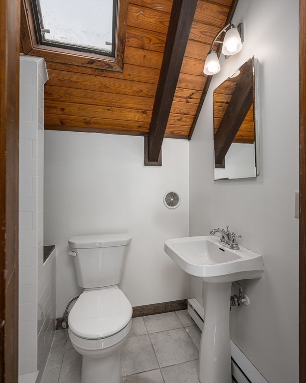 49 E Road Hawley, MA 01339 - Photo 19 of 42 a bathroom with a toilet sink and mirror