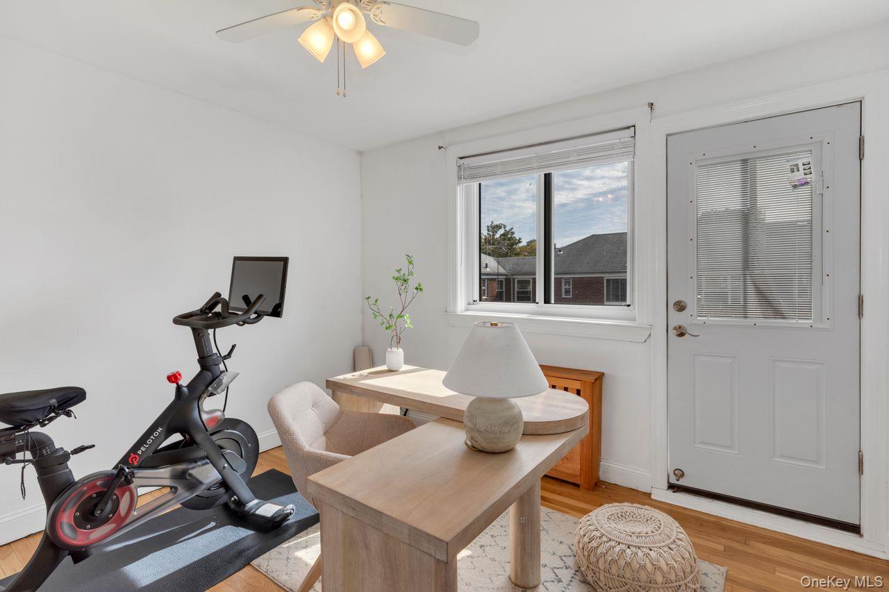 73-20 263rd Street, Unit G Queens, NY 11004 - Photo 17 of 24 a workspace with furniture and a window