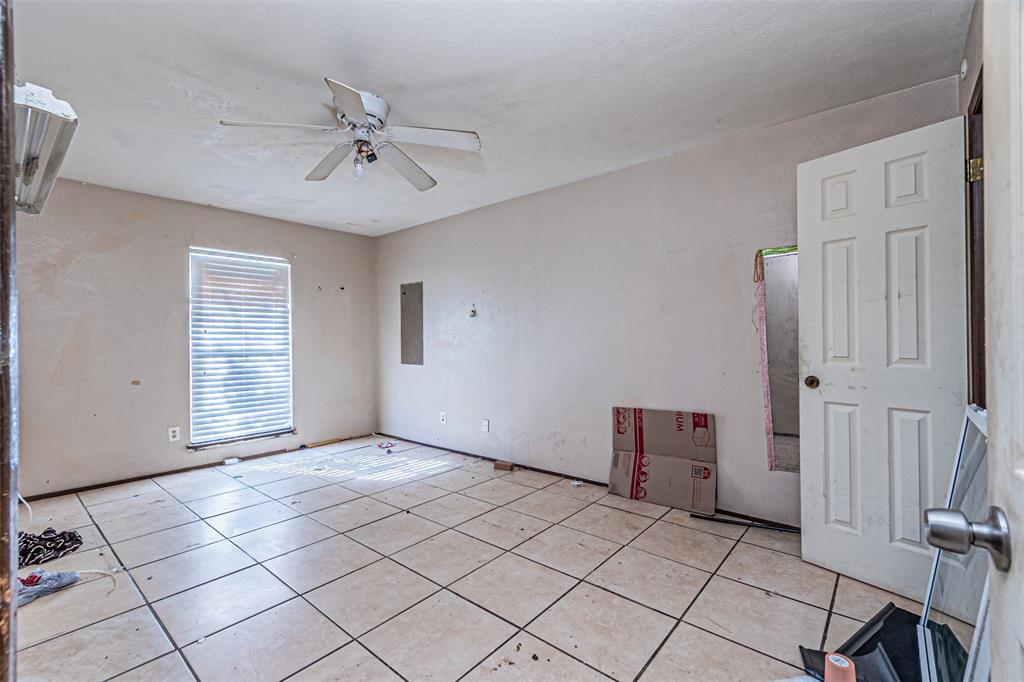 10315 Red Elm Road Dallas, TX 75243 - Photo 16 of 34 a view of an empty room with a window