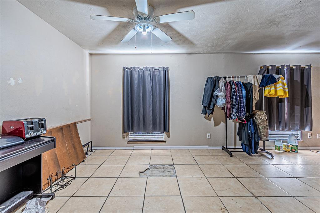 10315 Red Elm Road Dallas, TX 75243 - Photo 21 of 34 a view of an entryway with wooden floor