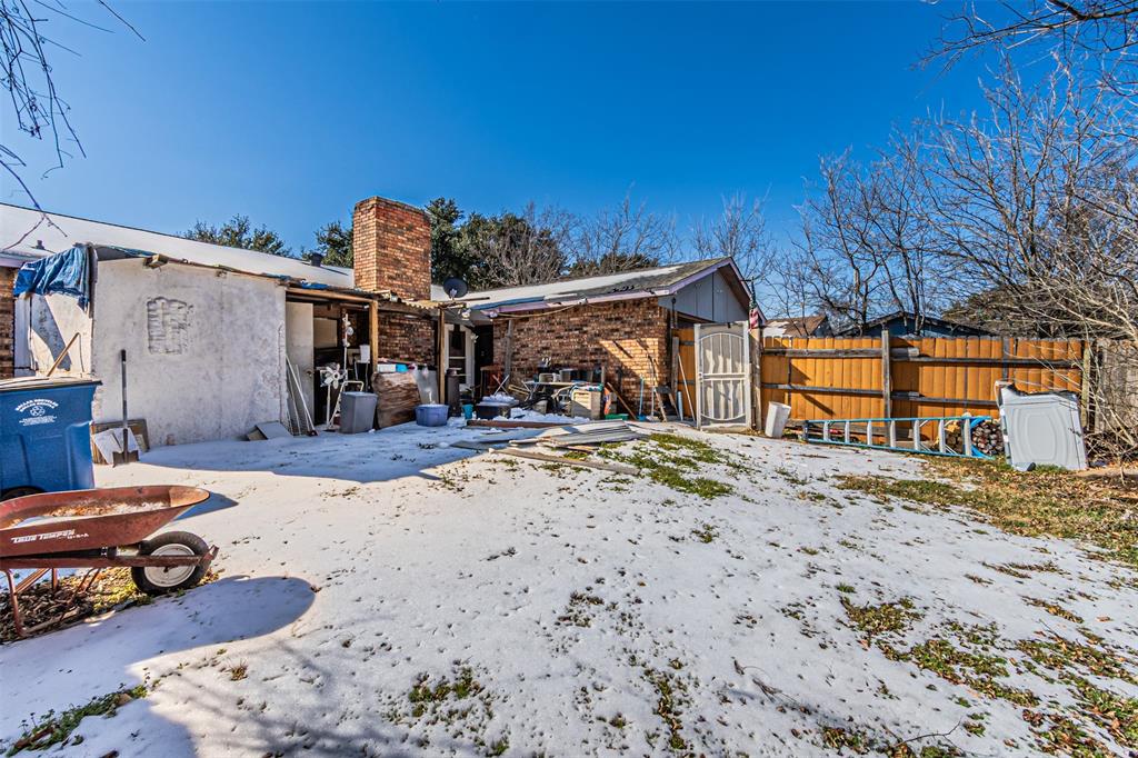 10315 Red Elm Road Dallas, TX 75243 - Photo 25 of 34 a view of a car park in front of a house