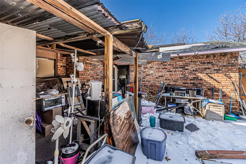 10315 Red Elm Road Dallas, TX 75243 - Photo 29 of 34 a view of a storage room with washer and dryer