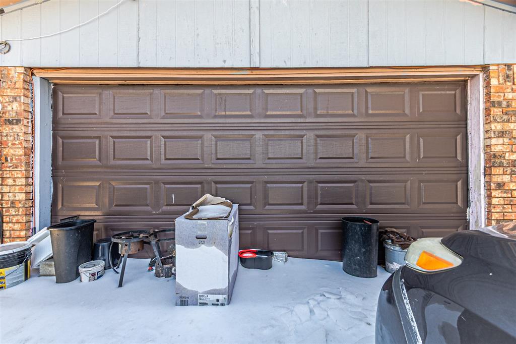 10315 Red Elm Road Dallas, TX 75243 - Photo 33 of 34 a view of storage and utility room with a sink