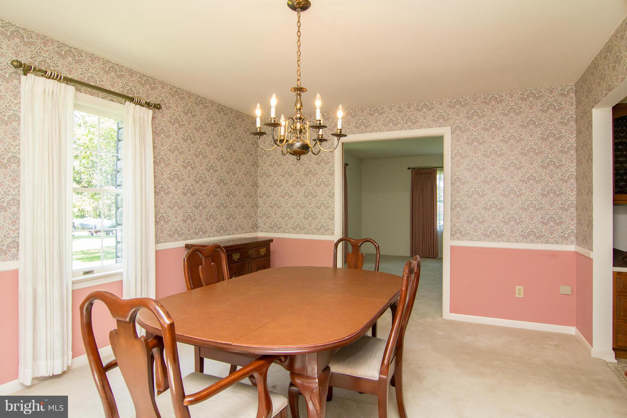 709 Sullivan Road Westminster, MD 21157 - Photo 22 of 30 a dining room with furniture and window