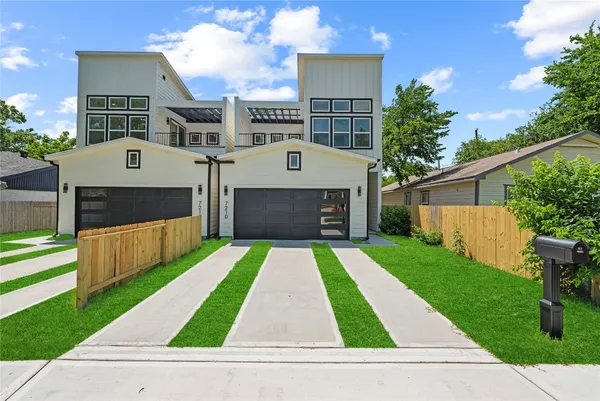a view of outdoor space yard and front view of a house