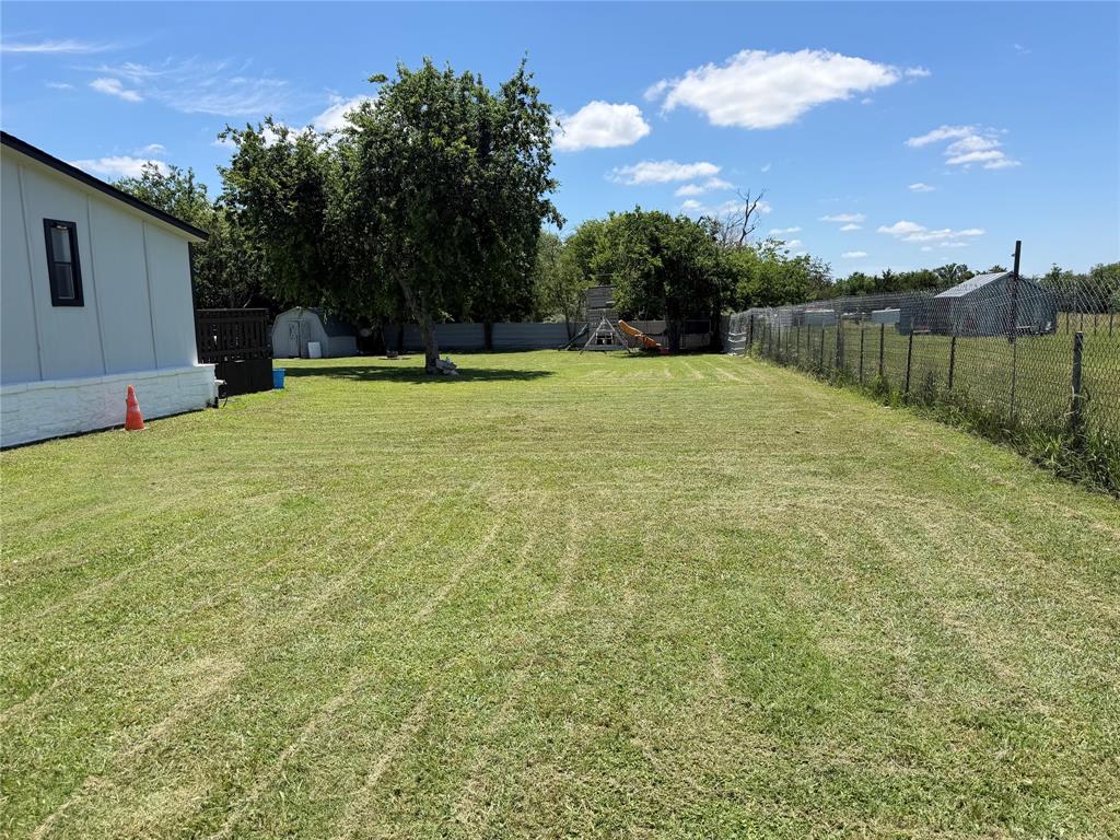222 Hix Road Cleburne, TX 76031 - Photo 19 of 27 a view of a backyard