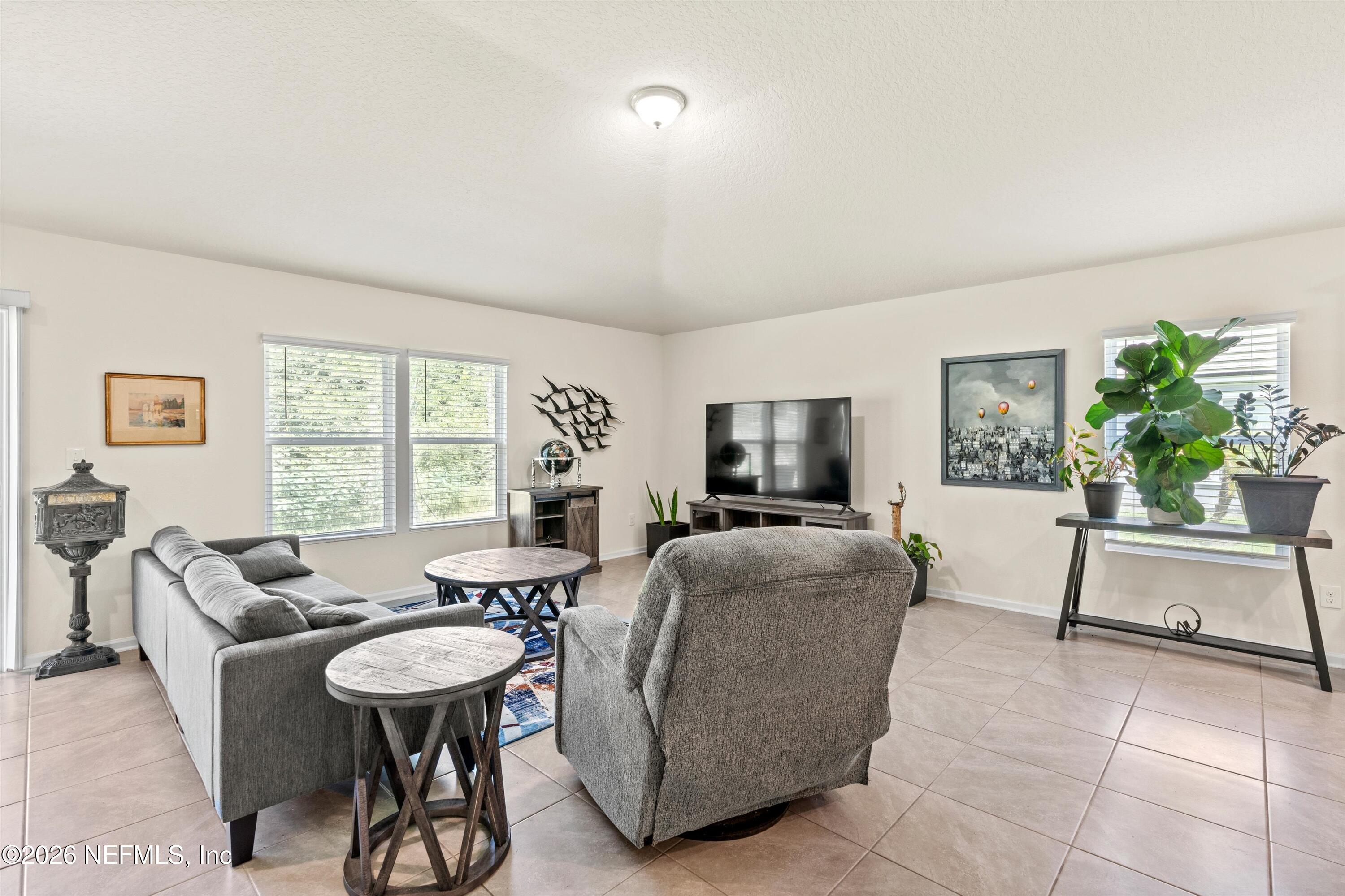 91 Rivertown Road Palm Coast, FL 32137 - Photo 11 of 36 12-Living Room