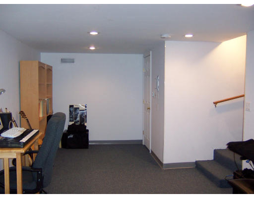 21 5th Avenue, Unit 21 Watertown, MA 02472 - Photo 13 of 15 a room with furniture and gym equipment