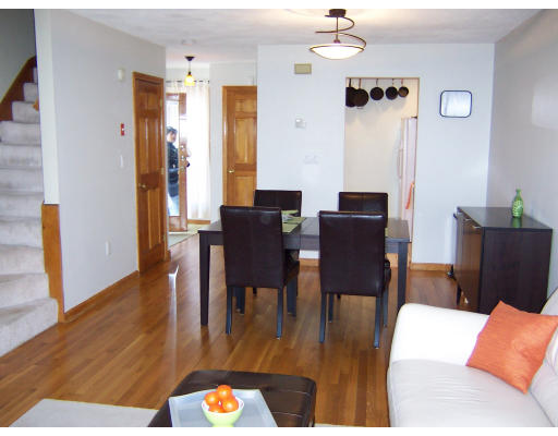 21 5th Avenue, Unit 21 Watertown, MA 02472 - Photo 6 of 15 a view of a dining room with furniture