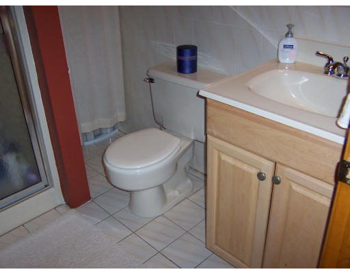 21 5th Avenue, Unit 21 Watertown, MA 02472 - Photo 9 of 15 a bathroom with a sink and toilet