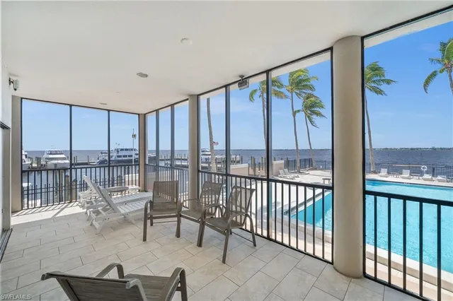 a balcony with chairs