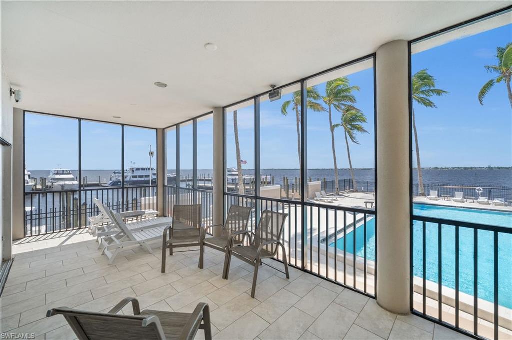 1900 Virginia Avenue, Unit 902 Fort Myers, FL 33901 - Photo 31 of 41 a balcony with chairs