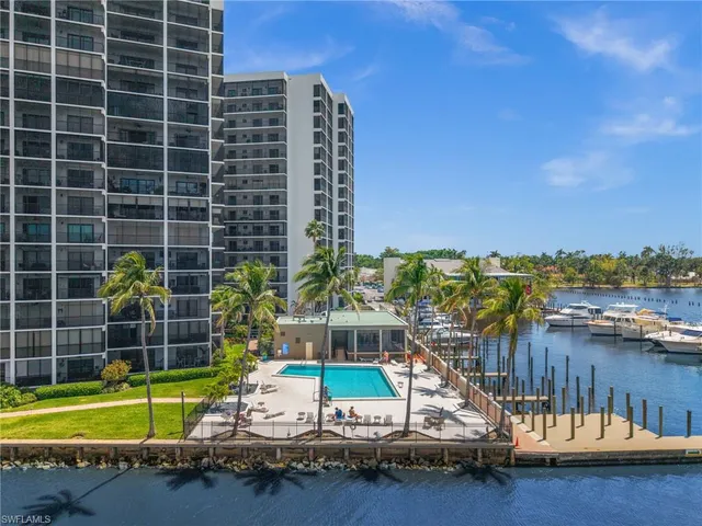 a view of a swimming pool with a lounge chairs