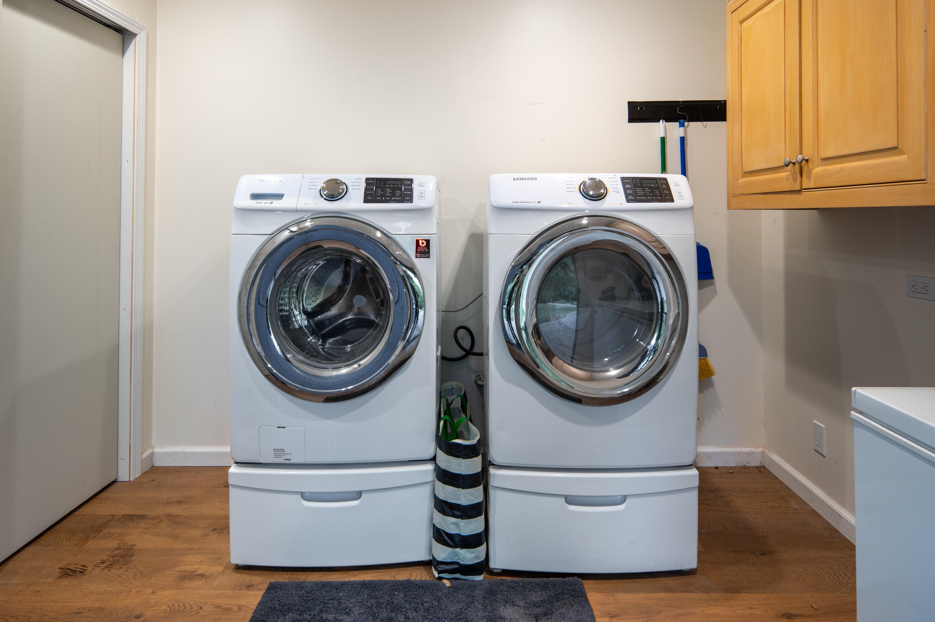 710 Ballard Canyon Road Solvang, CA 93463 - Photo 13 of 23 a view of a kitchen with washer and dryer