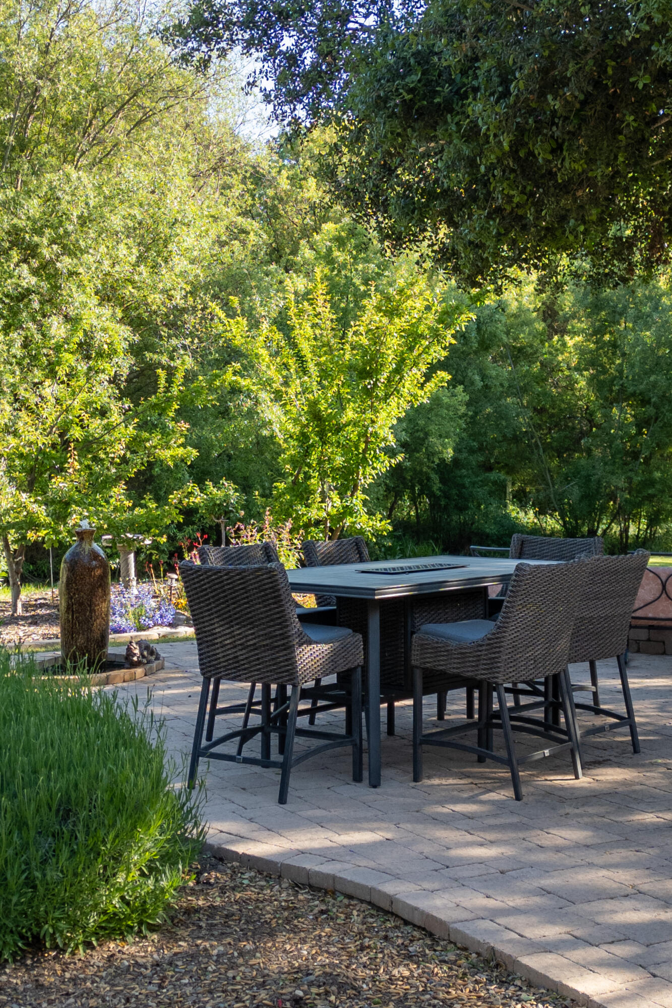 710 Ballard Canyon Road Solvang, CA 93463 - Photo 15 of 23 a backyard of a house with table and chairs