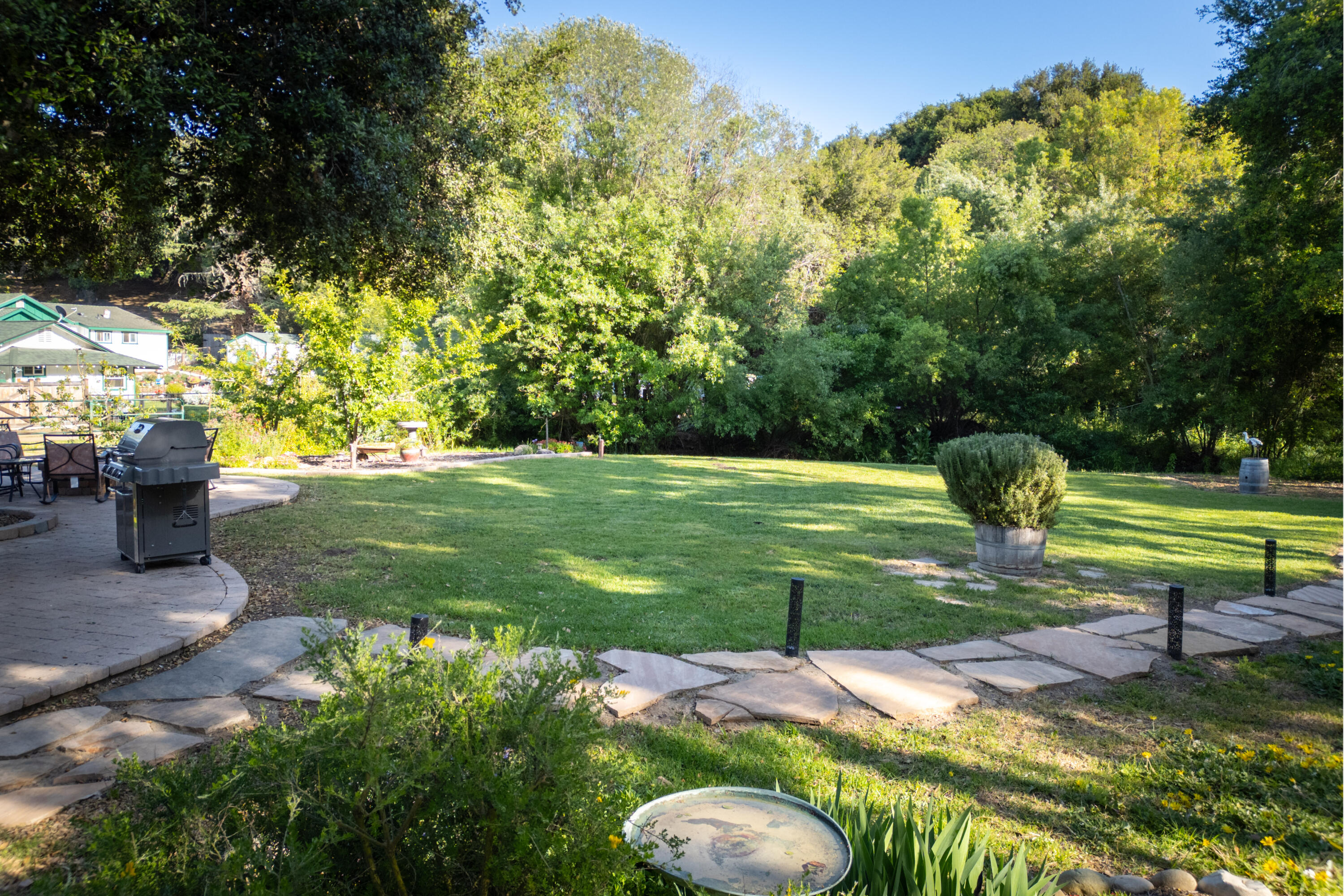 710 Ballard Canyon Road Solvang, CA 93463 - Photo 17 of 23 a view of a garden with a slide