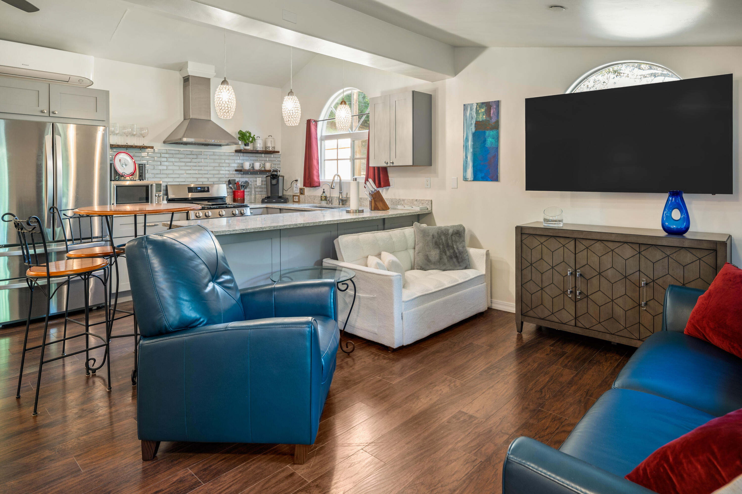 710 Ballard Canyon Road Solvang, CA 93463 - Photo 4 of 23 a living room with furniture and a flat screen tv